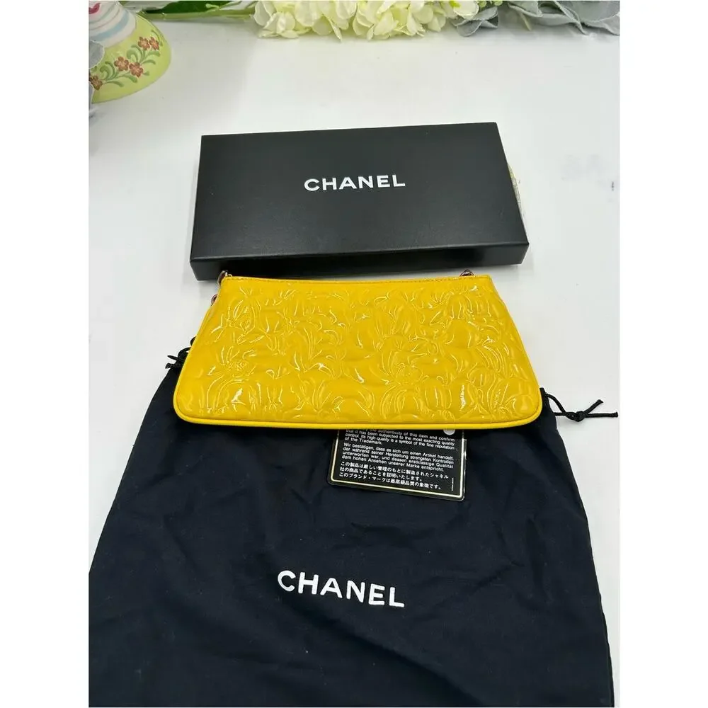Women's Chanel patent leather floral embossed shoulder bag made in Italy